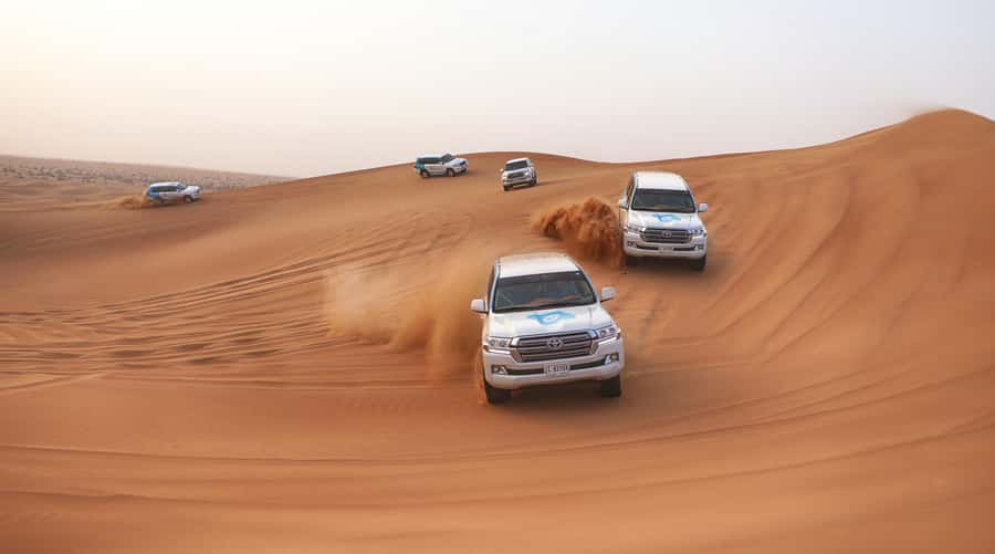 Dubai: Desert Safari with Camp, Dinner, & Optional Overnight - Dune bashing and sandboarding: the adrenaline part, explained