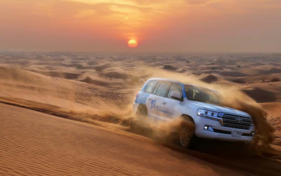 Dubai: Desert Safari with Camp, Dinner, & Optional Overnight - First stop at the camp: mocktail, ghutra photos, and tent comforts