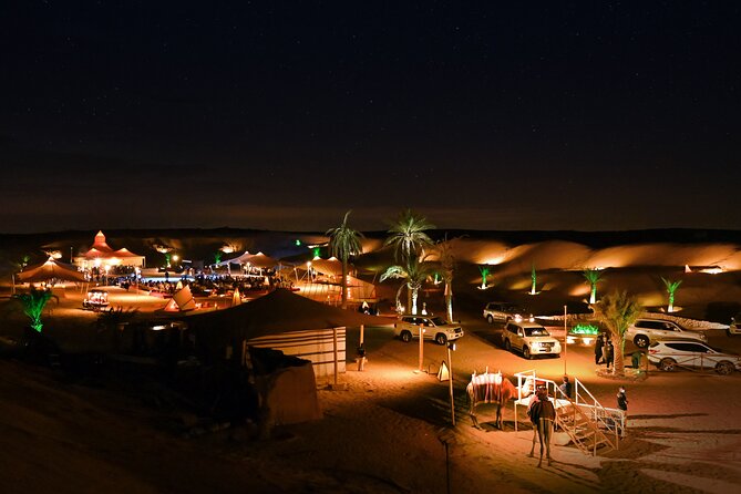 Dubai Desert Safari with Desert Camp Dinner, Camel Ride & Shows - Belly dancing, tanoura, and fire show: the ending that sells the night