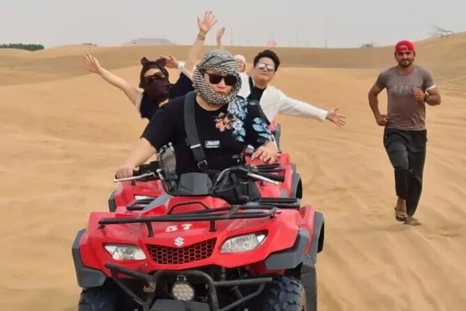 Dubai Desert Safari With Dinner And Live Shows - Dune Bashing in a Land Cruiser: Thrills, Seating, and Safety Checks