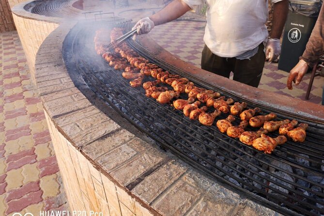 Dubai Desert Safari with Quad Bike, Camel Ride, Dinner and Shows - Sandboarding and henna: desert fun you can actually control