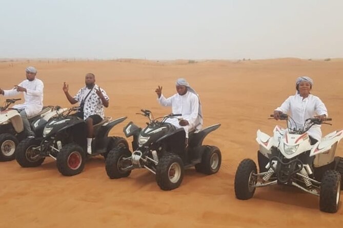 Dubai Desert Safari with Quad Bike, Camel Ride, Dinner and Shows - Camp food: buffet and BBQ plus unlimited drinks