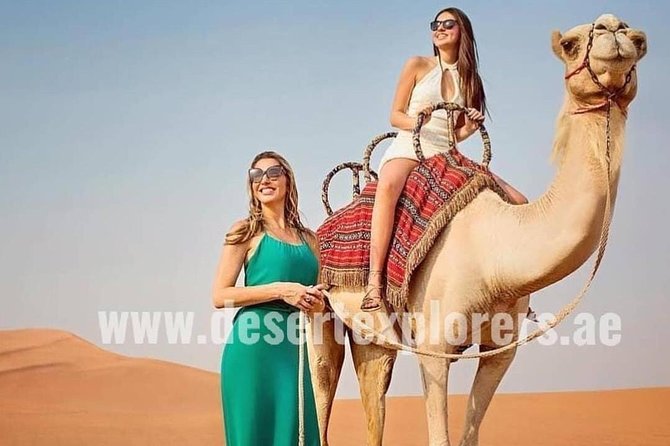 Dubai Desert Safari with Quad Bike, sandboarding, live show & BBQ - Dune bashing and sandboarding: thrills with a photo plan