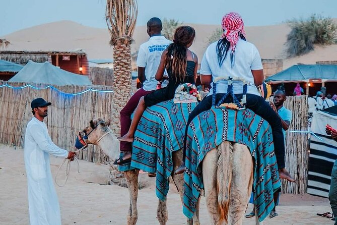 Dubai Desert Safari With Sandboarding & Camel Riding - BBQ dinner with vegetarian options: what’s included and what to expect