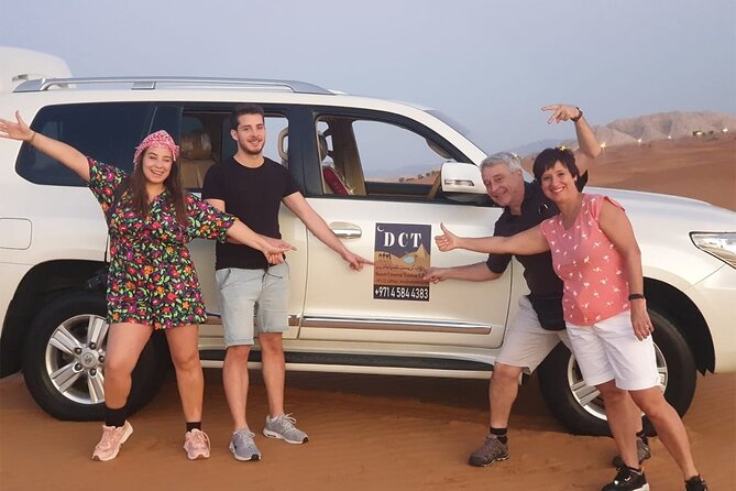 Dubai Desert Safari With Sandboarding & Camel Riding - Starlight performances: belly dance, Tanura, and fire shows