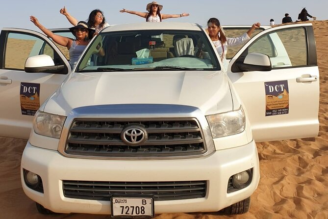 Dubai Desert Safari With Sandboarding & Camel Riding - Desert camp arrival in Lahbab: Arabic coffee, Legemat, camel rides, and henna