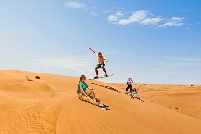Dubai Desert Safari with Self Drive Quad Biking & Camel Riding - Camp Evening: BBQ Buffet, Fire Show, Belly Dance, and Tanura