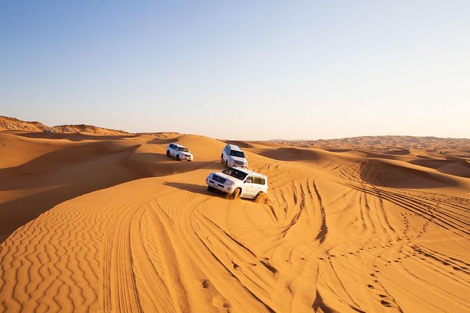 Dubai Desert Trail: Guided Quad/Polaris ATV & Red Dunes Safari - Sandboarding and Camel Ride: Short, Fun, and Not Over-Managed