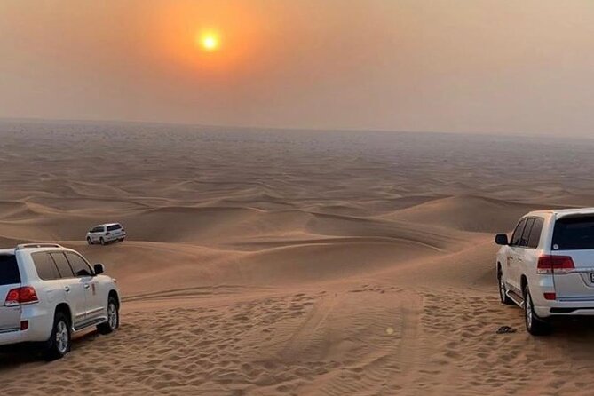 Dubai Dunes Safari With Quad Bike, Camel Ride, BBQ Dinner & Live Shows - Camel ride at sunset: photos, posture, and quick magic