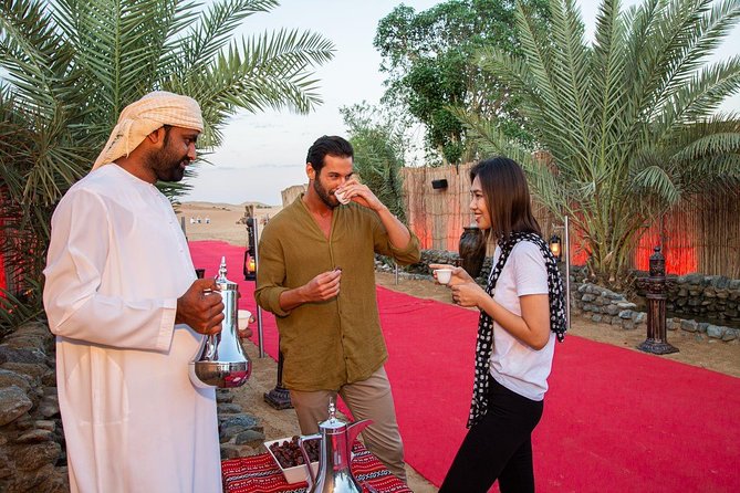 Dubai Evening Desert Safari: Sandboarding, BBQ, Camel Ride & more - Henna, Falcon Display, and Campfire Moments: Culture Without the Lecture