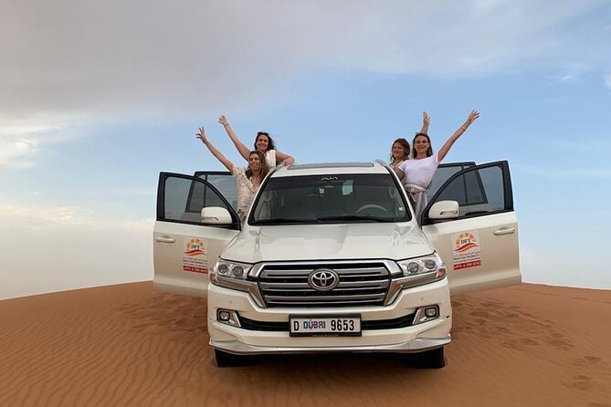 Dubai Evening Desert Safari with BBQ & Live Entertainment - Sandboarding and the Quick Hit of Action