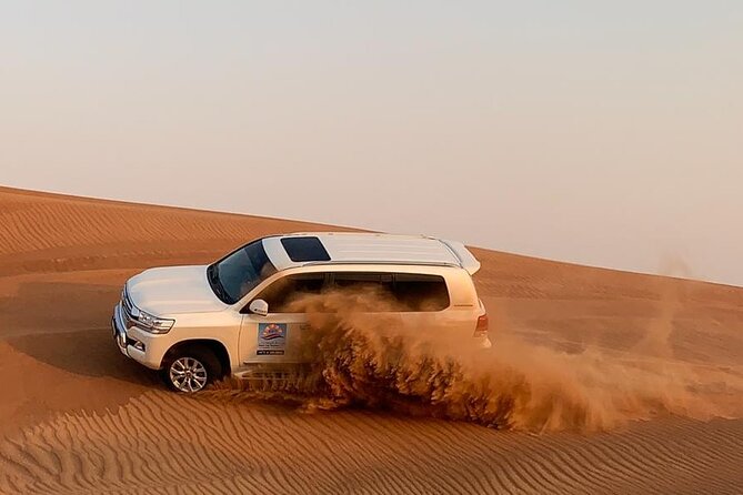 Dubai Evening Desert Safari with BBQ & Live Entertainment - Coffee, Dates, Henna Art, and Falcon Photo Ops