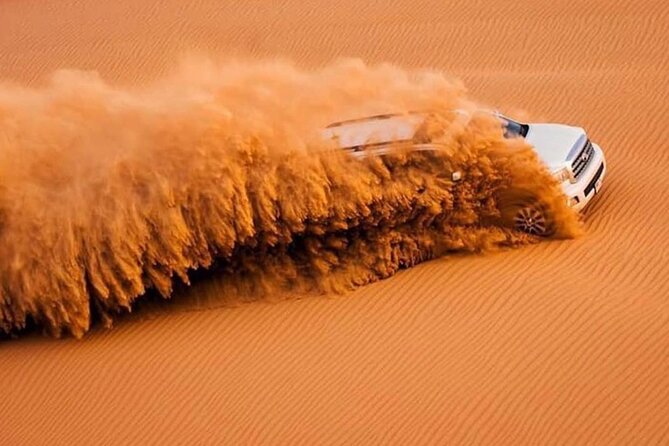 Dubai Evening Desert Safari With Quad Bike and BBQ Dinner - Beyond Quad Bikes: Camel Ride, Sandboarding, and Dune Bashing
