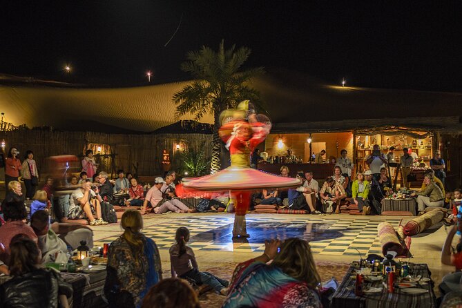 Dubai Evening Desert Safari with Thrilling Dune Buggy Adventure - Traditional camp setup: majlis-style comfort meets live entertainment