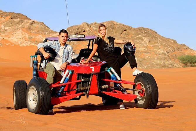 Dubai Evening Desert Safari With Transfers Dune Bashing & Dinner - The desert camp in Al Awir: welcome snacks, camel, falconry, and henna