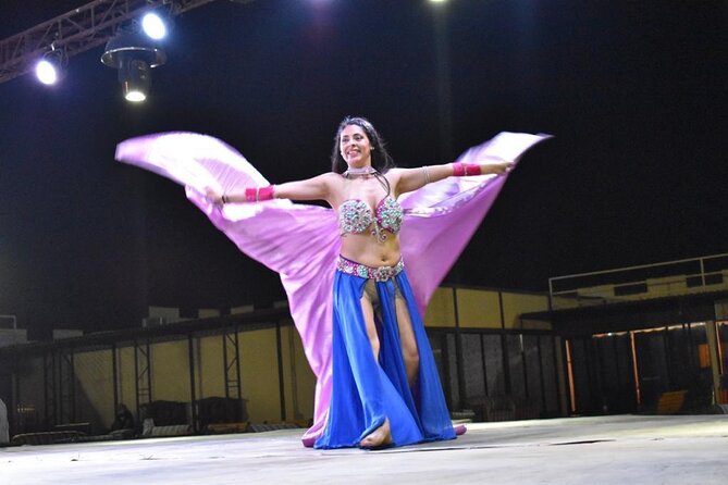 Dubai Evening Desert Safari With Transfers Dune Bashing & Dinner - Dinner under the stars: BBQ buffet plus a full show schedule