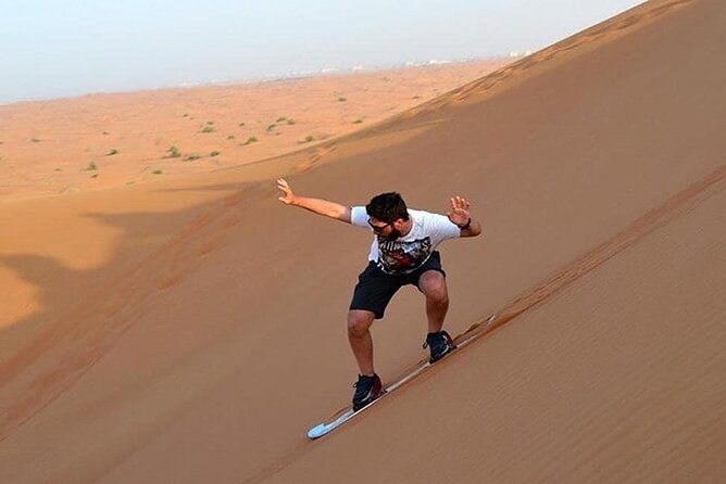 Dubai Evening Private Desert Safari with BBQ Dinner - Private 4x4 Pickup and the Skyline You See Before the Sand