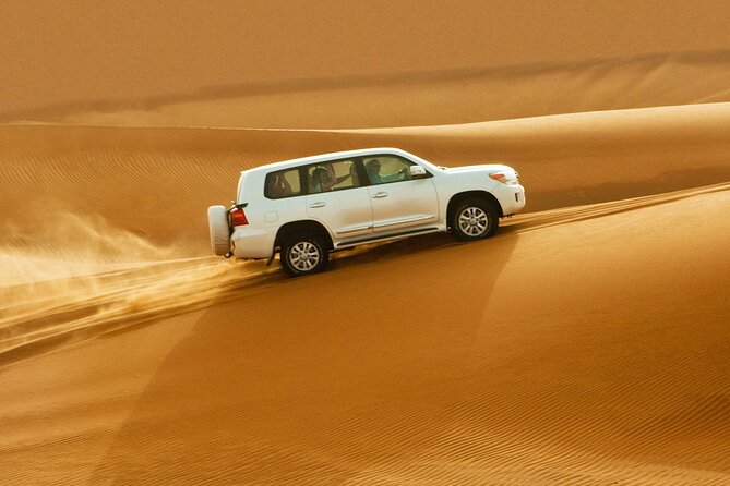 Dubai Evening4x4Desert Safari BBQ Dinner,4 Live Shows,Camel Ride - The 4WD Land Cruiser ride: dune bashing the right way