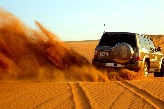 Dubai Evening4x4Desert Safari BBQ Dinner,4 Live Shows,Camel Ride - Sunset on the dunes: the photo stop that actually matters