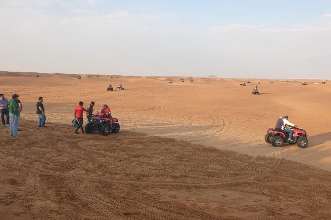 Dubai Half day Desert Safari Quad Bike & Flying Dress Photoshoot - From Dubai To Lahbab: How Pickup Sets the Tone
