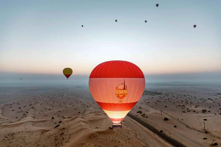 Dubai: Hot Air Balloon, Desert Safari, and Quad Biking Tour - Safari jeep time and wildlife spotting without the hard sell