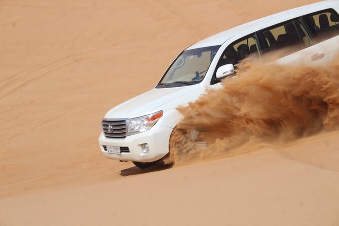 Dubai: Jeep Desert Safari, Camel Ride, and Quad Bike Tour - The Jeep dune bashing part: what to expect from the Land Cruiser ride