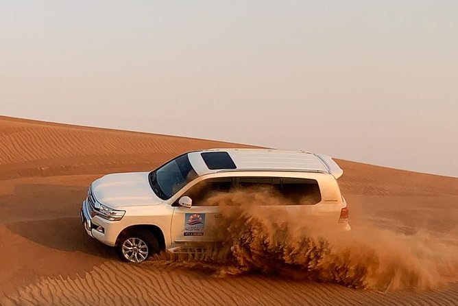 Dubai Morning Desert Safari: Camel Ride & Sandboarding! - 4WD Pickup and the Ride to Lahbab Desert
