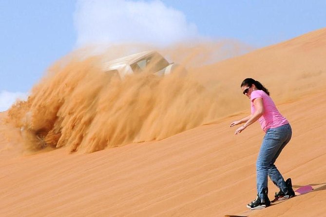 Dubai Morning Desert Safari: Camel Ride & Sandboarding! - Camel Riding on Red Dunes