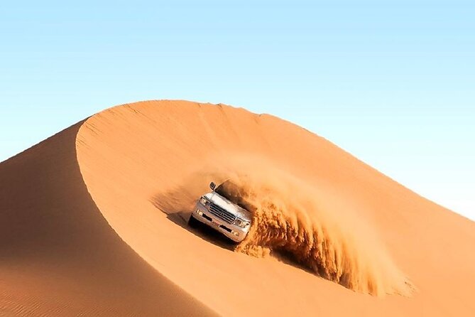 Dubai Premium Red Dunes Safari Camel Ride and BBQ Dinner - Sandboarding and Sunset Views: How the Photo Stops Fit the Rhythm
