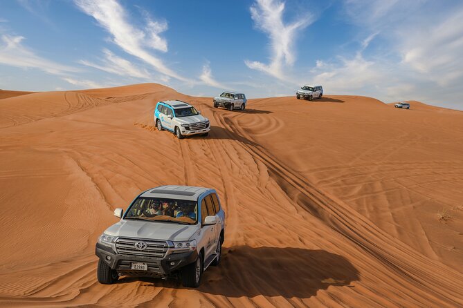 Dubai Premium Red Dunes Safari, Camels & 5<em> BBQ at Al Khayma camp – ATVs: Optional Fun, Separate Risk, Extra Cost’ /><br />
ATVs (quad biking) can add another layer of thrill, and the tour offers it as an optional add-on. But this is important: quad biking is not included for everyone, it’s on request, and it’s listed as at your own expense.</p>
<p><p>There’s also a separate safety and responsibility note: damages, injuries, or lost items during the quad segment are not covered by your insurance in the way the main safari is. In plain terms, treat ATV time like a different activity with different rules.</p>
</p>
<p><p>If you’re not sure, I’d decide based on your comfort with bumpy riding. If you already get your adrenaline from dune bashing and sandboarding, you might find ATVs are overkill. If you love speed and want more time moving, ATV time can be a good add-on—just go in with the understanding it’s your responsibility.</p>
</p>
<h2 id="safety-and-comfort-what-the-tour-says-and-how-to-plan-smart">Safety and Comfort: What the Tour Says, and How to Plan Smart</h2>
<p><img width="669" height="446" decoding="async" src=