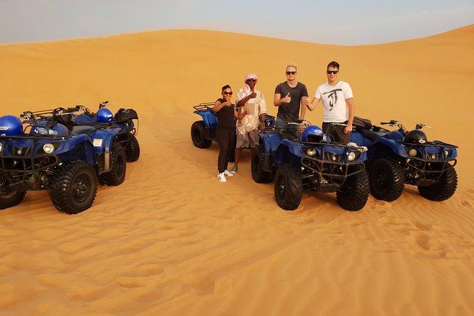 Dubai: Quad Bike Safari, Camels, & Camp with BBQ Dinner - Dubai Pickup to Red Dunes: how the day gets going