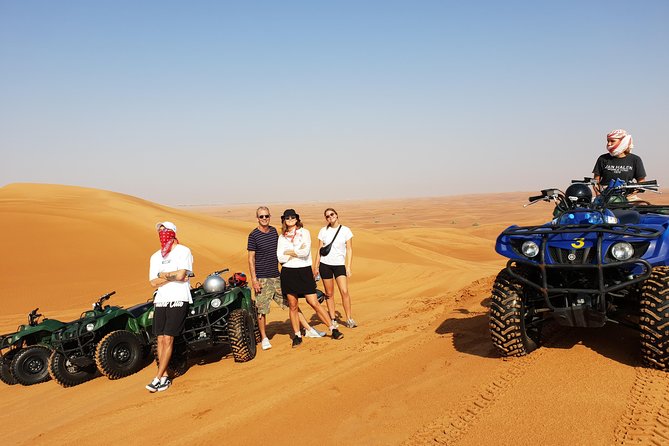 Dubai: Quad Bike Safari, Camels, & Camp with BBQ Dinner - Quad Bike Safari Across the red dunes: shared vs private