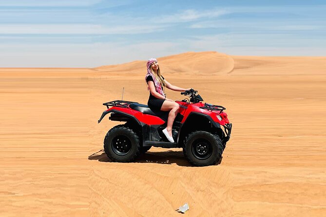 Dubai: Quad Bike Safari, Camels, & Camp with BBQ Dinner - Bedouin camp dinner and the shows you get with the BBQ option