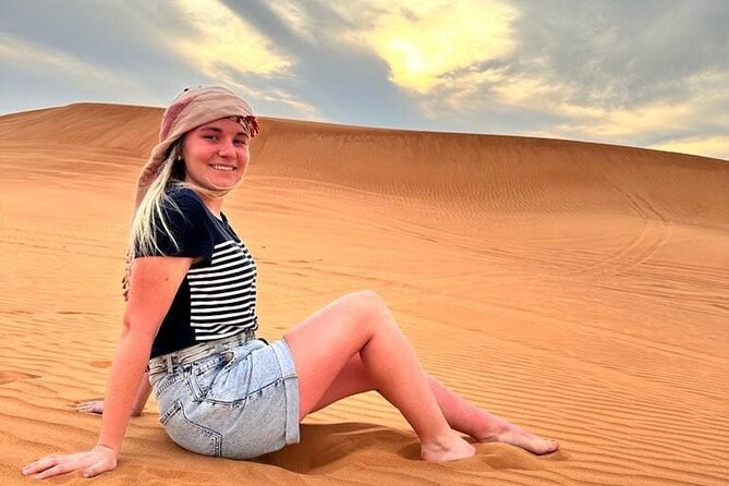 Dubai Red Desert Safari sharing basis with Camel, Shows & Dinner - Bedouin camp arrival: cushions, Arabic coffee, henna, and camel photos