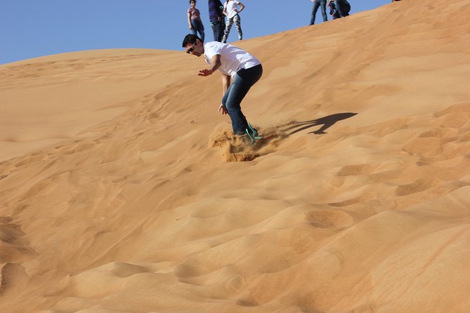 Dubai Red Dune Desert Safari, Buggy Ride & BBQ Buffet Dinner - Live shows and dessert-of-the-night energy