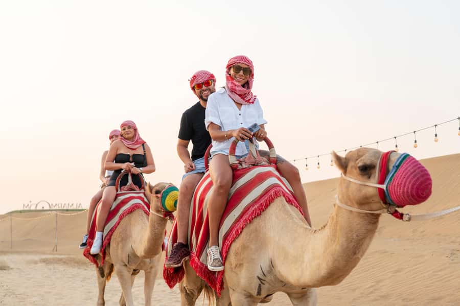 Dubai: Red Dune Desert Safari, Quad Bike, Camels, and BBQ - Dubai pickup to red-dune desert: how the day starts