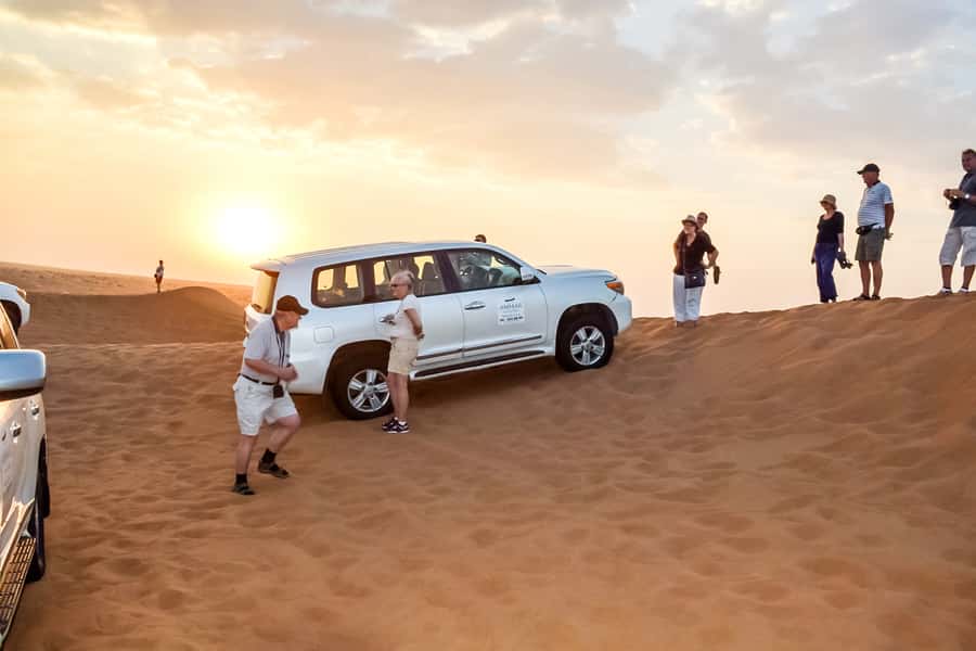 Dubai: Red Dune Safari, Quad Bike, Camel Ride, BBQ Dinner - Sandboarding on Golden Sands (and Getting the Photos)