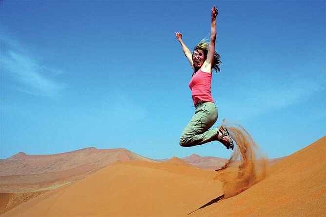 Dubai Red Dune Safari with BBQ Dinner and Live Shows - The Shows Under the Stars: Tanoura, Belly Dance, Fire