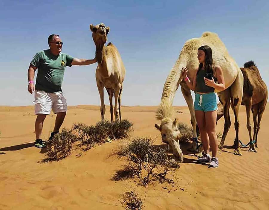 Dubai: Red Dunes Desert Safari with Premium Camp BBQ & Shows - Premium Desert Camp Welcome: Gahwa, Henna, Arabic Dress Photos