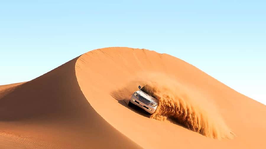 Dubai: Safari, Quad Bike, Camel Ride, and Buffet Dinner - Red-Dune Dune Bashing: Where the Adrenaline Is Actually Managed