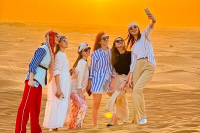 Dubai Sunset Red Dune Desert Safari, Sandboarding and Camel Ride - Sandboarding + Short Camel Ride: A Fun Mix of Fast and Slow
