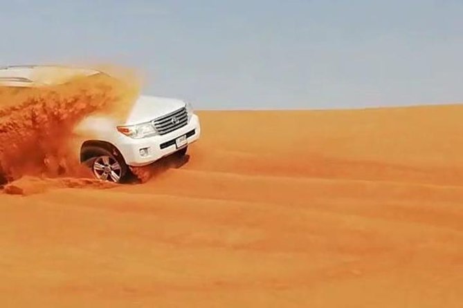Dubai: Unique MORNING 4WD Red Dunes Safari incl. 30min Quad Bike - Camel ride: the slow-motion break that balances the adrenaline