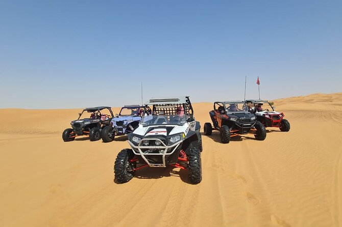 Dubai: Unique SUNSET Buggy Red Dunes Safari - BBQ dinner, henna, and the shows under the desert sky