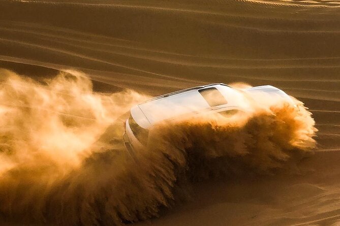 Dubai Unique Sunset Combo: 4WD and Quad Bike Red Dunes Safari - 4WD red-dune bashing and sandboarding: thrill with structure