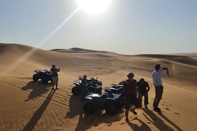 Dubai Unique Sunset Combo: 4WD and Quad Bike Red Dunes Safari - Desert camp BBQ buffet and live entertainment that goes beyond dinner