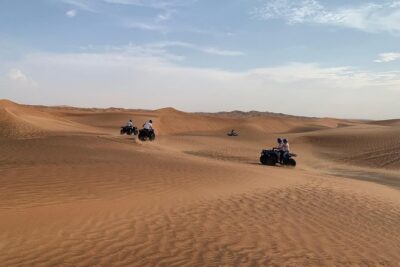 Dubai: Unique SUNSET Quad Bike Red Dunes Safari - The desert camp BBQ: what happens after the rides