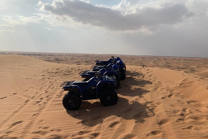 Dubai: Unique SUNSET Quad Bike Red Dunes Safari - Price and value: is $99 worth a 3-in-1 sunset package?