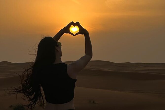 Dubai VIP Desert Safari & Sunset , Camel Ride, Premium dinner - Camel Riding and Sandboarding: Short, Fun, and Perfect for Sunset Timing