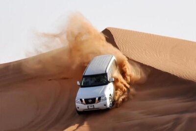 Evening Desert Safari Dubai with Belly Dance - Entering the Camp Flow: Camel Riding, Henna, Sandboarding
