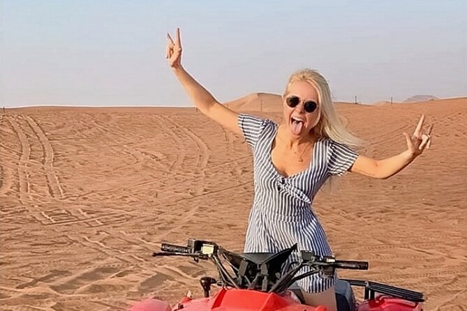 Evening Desert Safari from Dubai with Quad Bike Ride - The desert camp: Arabic tea, dress photos, henna, and a falcon